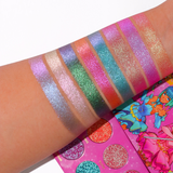 The "Viral Magical Guardian Glitter palette " features Eight super sparkly and dazzling duochrome shades that color shift into two colors. This Glitter palette is in pink packaging and features an orange duochrome eyeshadow, a pink and purple duo chrome eyeshadow, a blue duochrome eyeshadow, a green duochrome eyeshadow, a purple duochrome eyeshadow, a white duochrome eyeshadow. This Glitter duochrome eyeshadow palette is the best glitter palette on the market. Glitter palette, Glitter eyeshadow