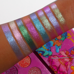 The "Viral Magical Guardian Glitter palette " features Eight super sparkly and dazzling duochrome shades that color shift into two colors. This Glitter palette is in pink packaging and features an orange duochrome eyeshadow, a pink and purple duo chrome eyeshadow, a blue duochrome eyeshadow, a green duochrome eyeshadow, a purple duochrome eyeshadow, a white duochrome eyeshadow. This Glitter duochrome eyeshadow palette is the best glitter palette on the market. Glitter palette, Glitter eyeshadow