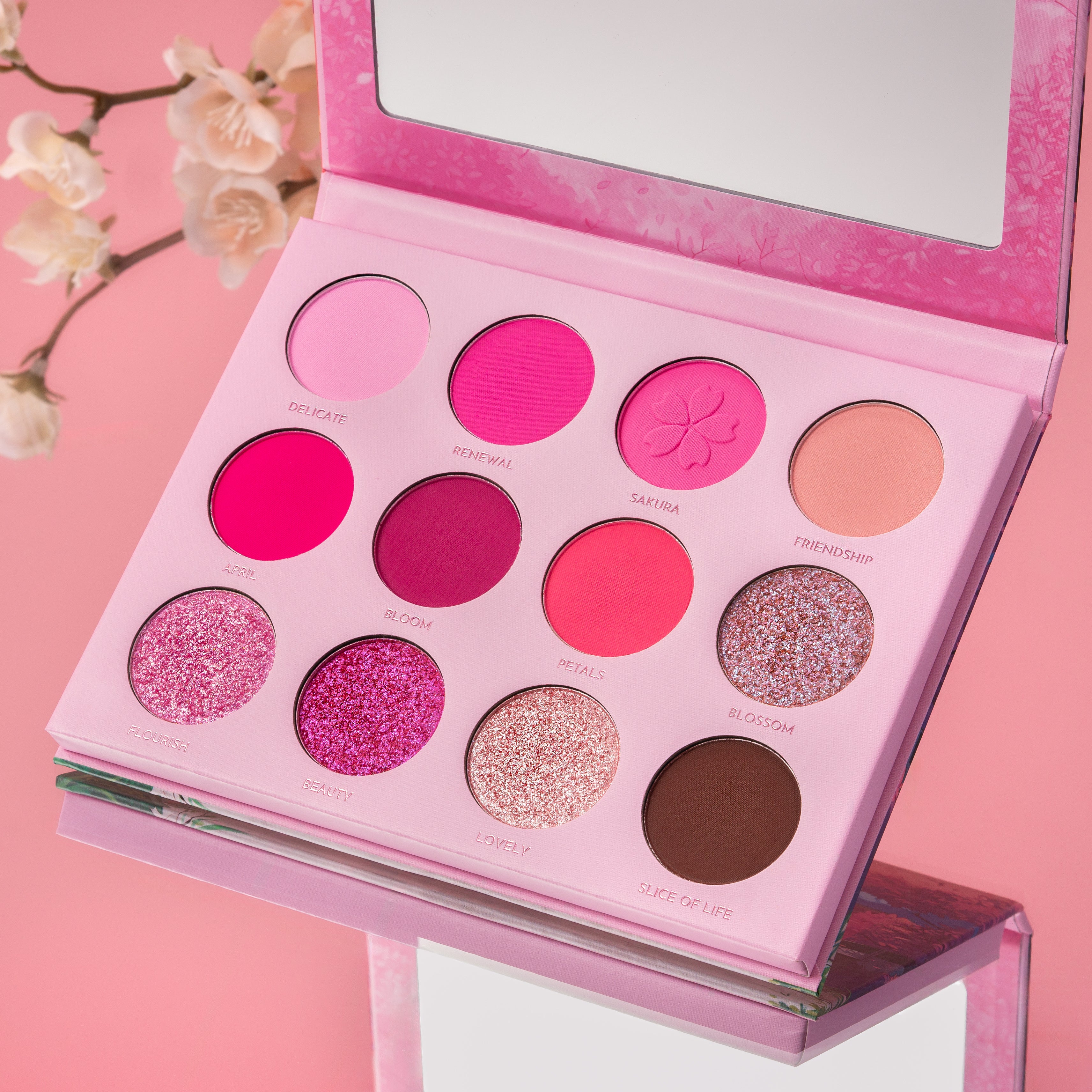 Our Pink focused Sakura eyeshadow palette is a pink lover's dream! From soft pastels to bold hot pink, this eyeshadow palette offers an array of dreamy colors inspired by cherry blossoms. Also Inspired by slice of life shoujo anime, this palette captures the beauty of new beginnings and friendship.
This eyeshadow palette includes:
12 shades in total
8 Pigmented Matte eyeshadows
4 Buttery Soft Shimmer eyeshadows
Buildable and Blendable Formula
Color shifting Duochrome glitter shadow