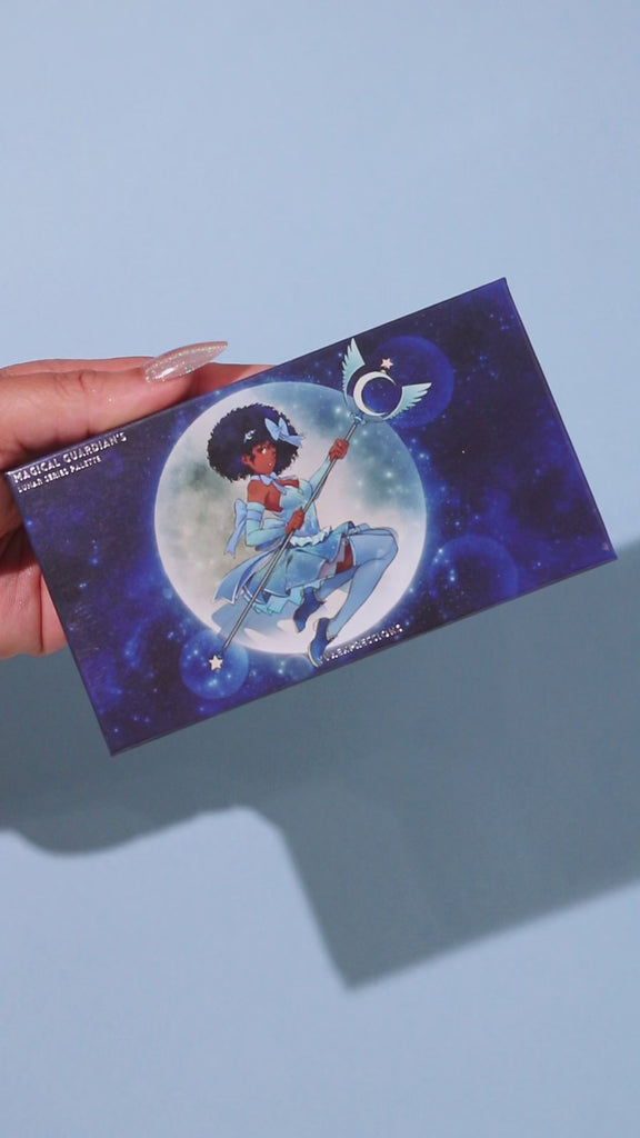 open magical guardian 8 pan duochrome lunar palette, swatches of blue duochrome eyeshadow, sparkly colorshifting arm swatches of the magical guardian lunar palette. Sparkly duochrome swatches on medium skin tone. 